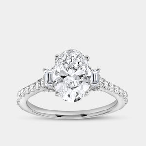 Gilded 2 and 1/2 Carat Lab-Grown Diamond Oval-Shaped Solitaire Plus Engagement Ring with Baguette Accents and a Classic Shank