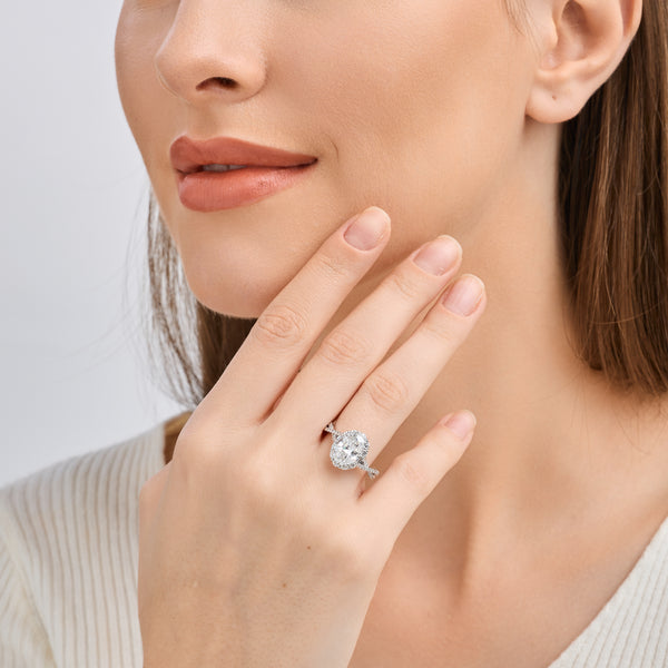 2 and 3/4 Carat Lab-Grown Diamond Oval-Shaped Halo Engagement Ring with a Crossover Shank — GILDED New York