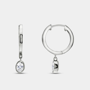 Gilded 3/8 Carat Lab-Grown Diamond Huggie Hoop Earrings with a Oval-Shaped, Bezel-Set Drop