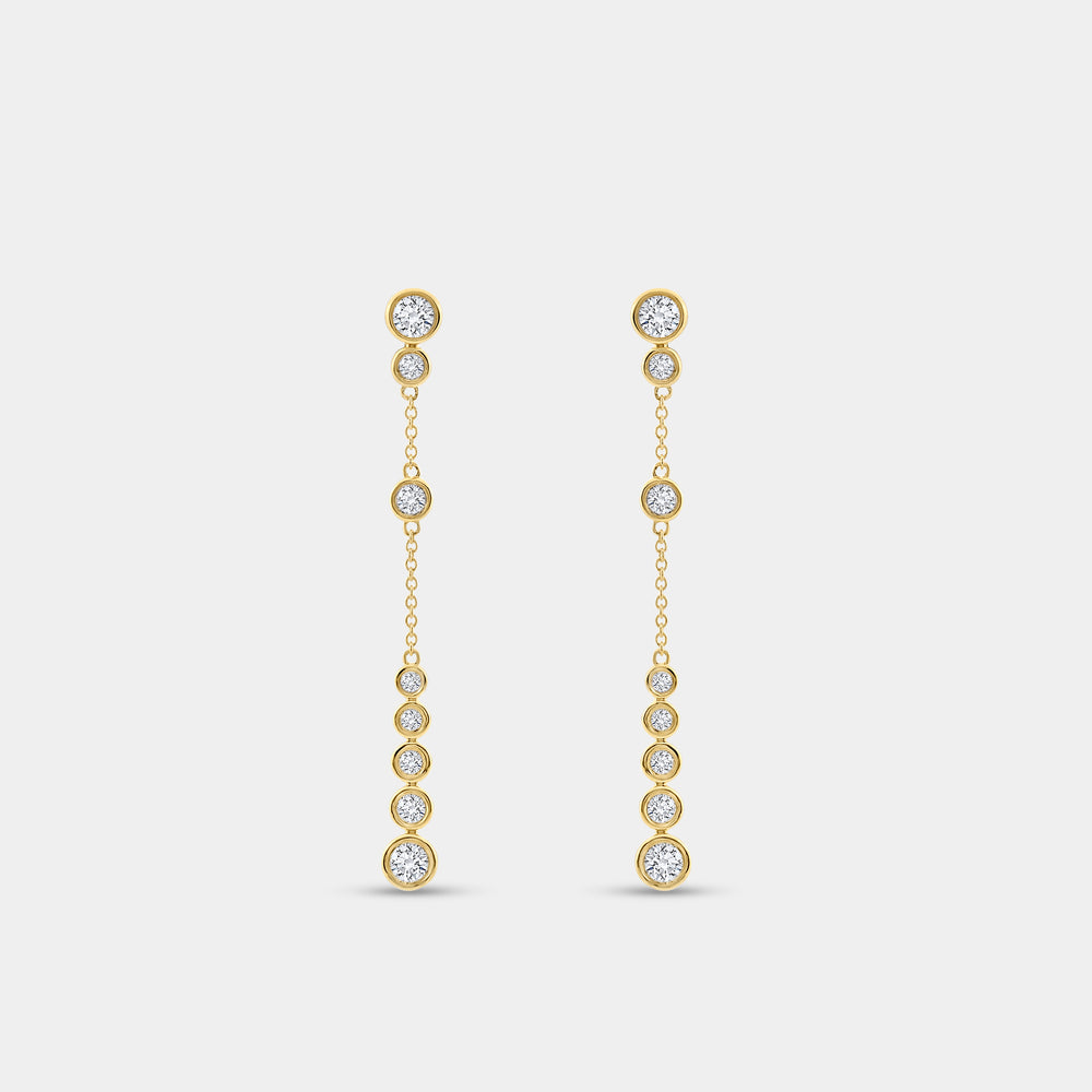 Gilded 1 and 1/2 Carat Lab-Grown Diamond Drop Earrings with a Chain and Graduating Bezel-Set Stones