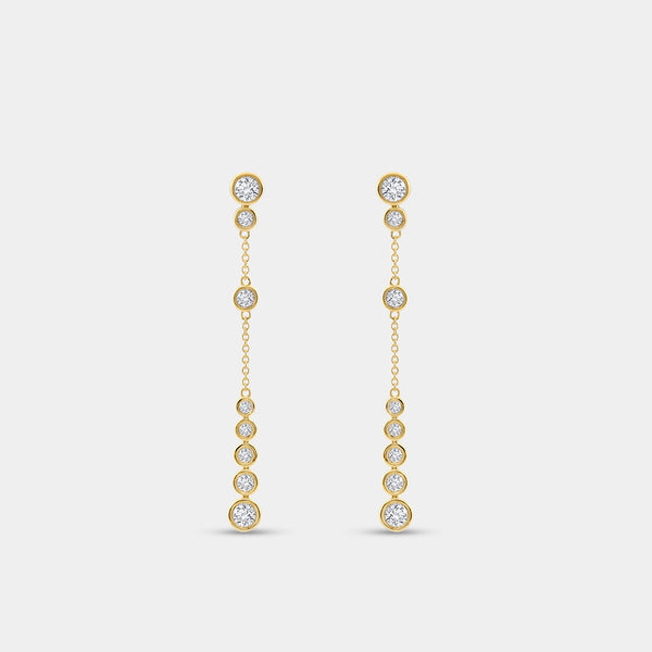 Gilded 1 and 1/2 Carat Lab-Grown Diamond Drop Earrings with a Chain and Graduating Bezel-Set Stones