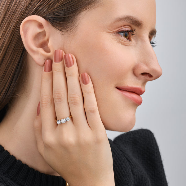 Gilded 1/2 Carat Lab-Grown Diamond Round-Shaped Three-Stone Ring Set In An Illusion Plate
