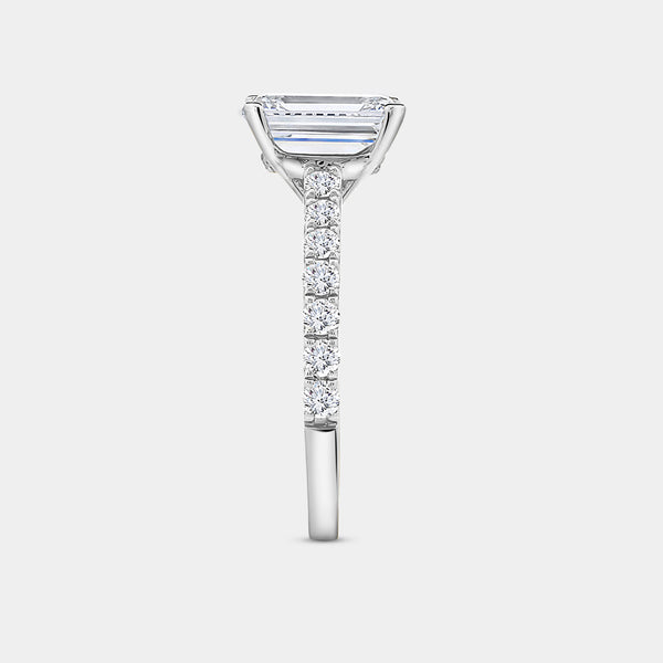 Gilded 2 and 1/2 Carat Emerald-Cut Solitaire Plus Engagement Ring with a Classic Shank