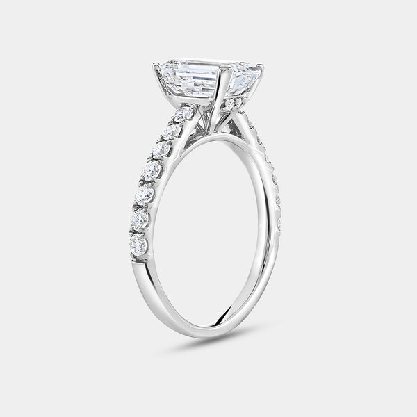 Gilded 2 and 1/2 Carat Emerald-Cut Solitaire Plus Engagement Ring with a Classic Shank