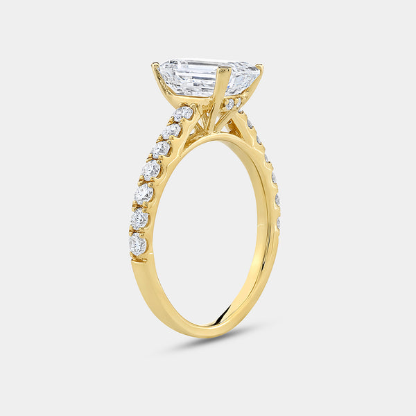 Gilded 2 and 1/2 Carat Emerald-Cut Solitaire Plus Engagement Ring with a Classic Shank