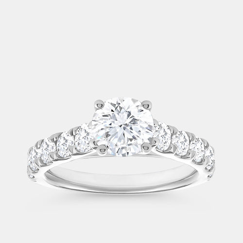 Gilded 2 Carat Lab-Grown Diamond Solitaire Plus Engagement Ring with a Round-Shaped Center and Composite Sides
