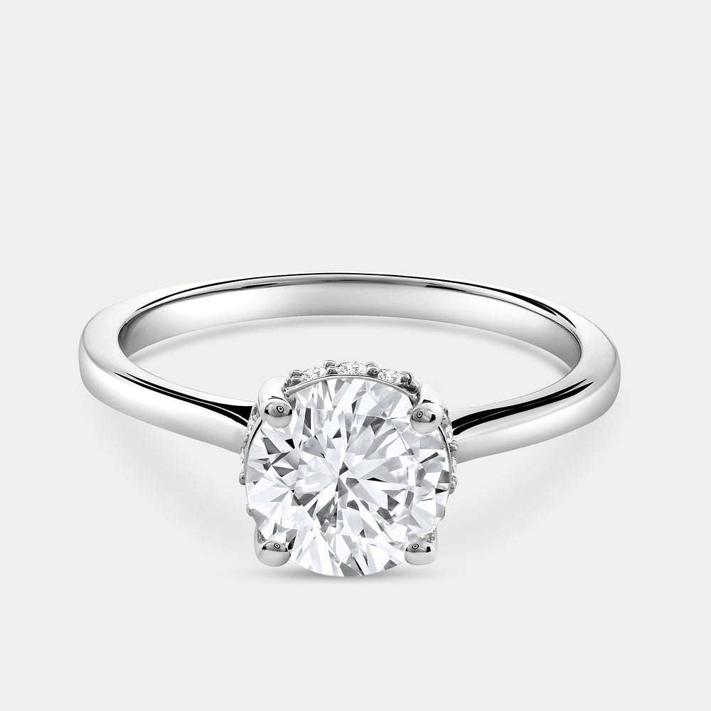 Gilded 1 and 1/3 Carat Lab-grown Diamond Round-Shaped Solitaire Ring with a Side Detail Halo