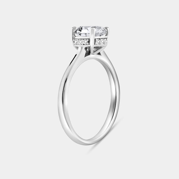 Gilded 1 and 1/3 Carat Lab-grown Diamond Round-Shaped Solitaire Ring with a Side Detail Halo