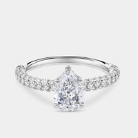 Gilded 1 and 1/2 Carat Lab-Grown Diamond Pear-Shaped Solitaire Plus Ring with a Pavé Shank