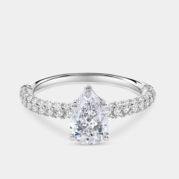 Gilded 1 and 1/2 Carat Lab-Grown Diamond Pear-Shaped Solitaire Plus Ring with a Pavé Shank
