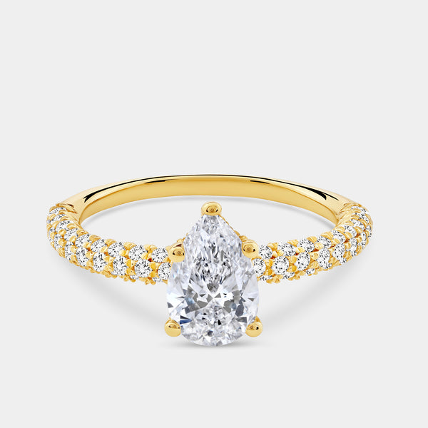 Gilded 1 and 1/2 Carat Lab-Grown Diamond Pear-Shaped Solitaire Plus Ring with a Pavé Shank