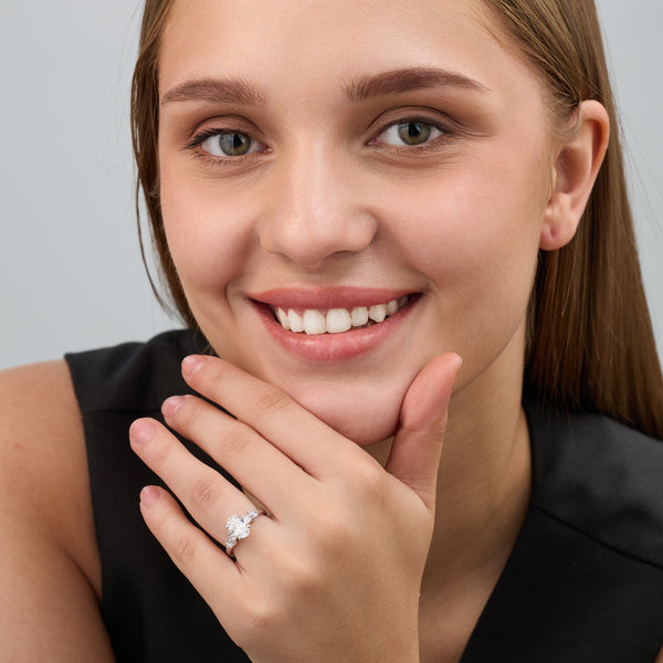 Gilded 2 Carat Lab-Grown Diamond Oval-Shaped Solitaire Plus Engagement Ring with Round-Shaped Accents On The Shank