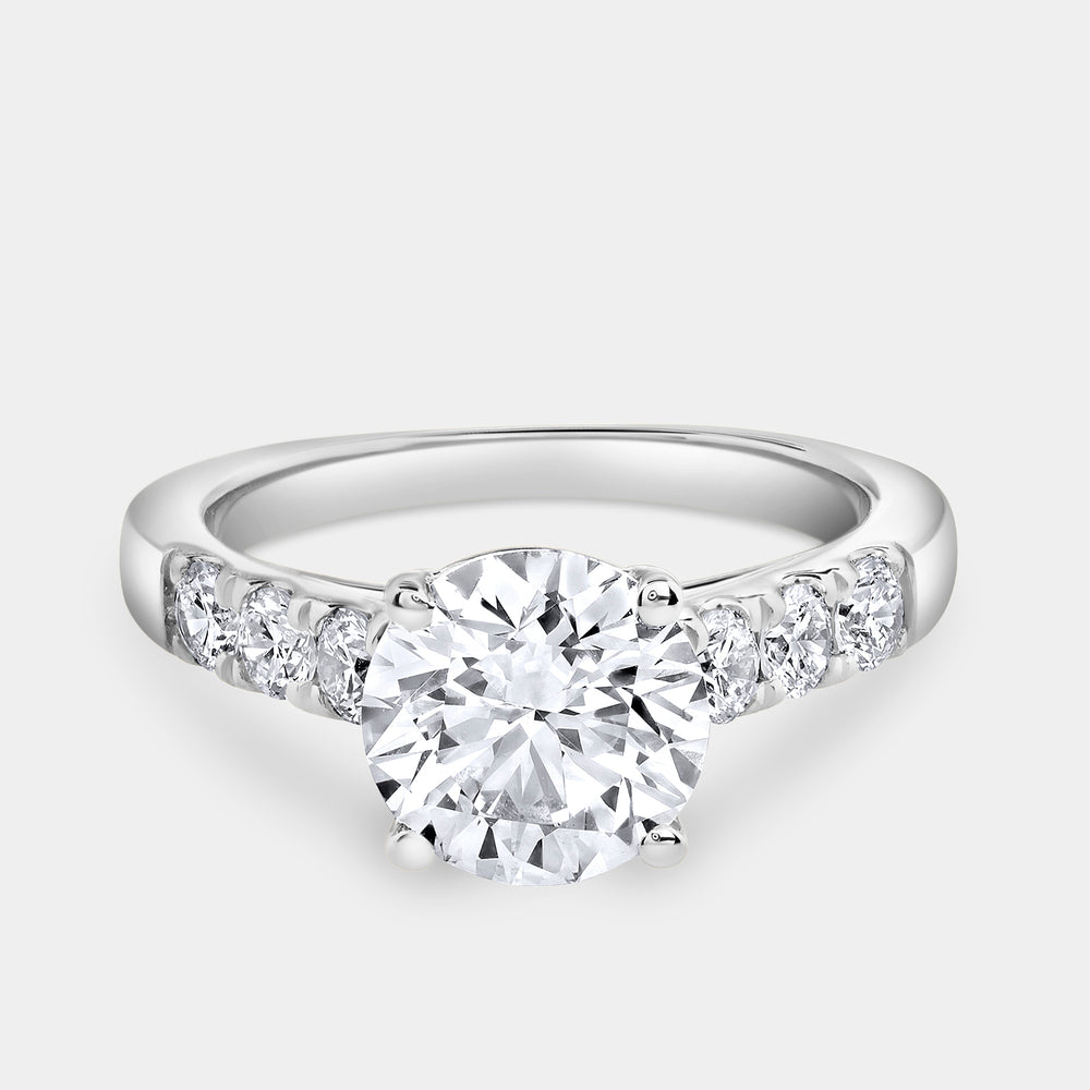 Gilded 2 and 1/2 Carat Lab-Grown Diamond Round-Shaped Solitaire Plus Engagement Ring with an Accented Shank