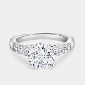 Gilded 2 and 1/2 Carat Lab-Grown Diamond Round-Shaped Solitaire Plus Engagement Ring with an Accented Shank