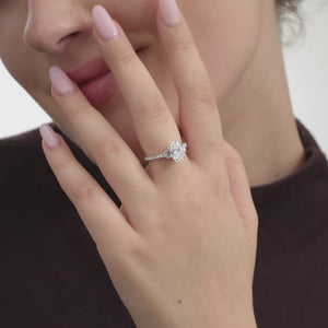 Gilded 2 and 1/2 Carat Lab-Grown Diamond Oval-Shaped Solitaire Plus Engagement Ring with Baguette Accents and a Classic Shank