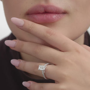 Gilded 2 and 1/2 Carat Emerald-Cut Solitaire Plus Engagement Ring with a Classic Shank