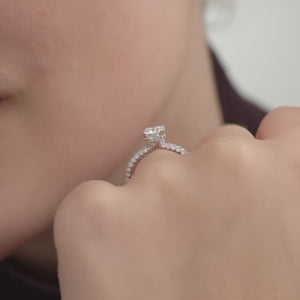 Gilded 1 and 1/2 Carat Lab-Grown Diamond Round-Shaped Solitaire Plus Ring with a Pavé Shank