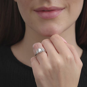 Gilded 2 Carat Lab-Grown Diamond Solitaire Plus Engagement Ring with a Round-Shaped Center and Graduated Composite Sides