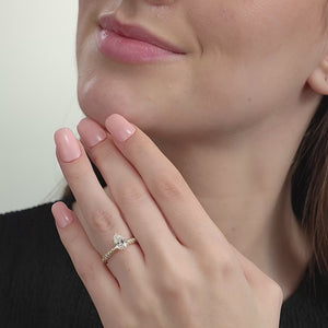 Gilded 1 and 1/2 Carat Lab-Grown Diamond Pear-Shaped Solitaire Plus Ring with a Pavé Shank