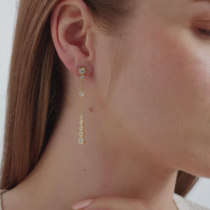 Gilded 1 and 1/2 Carat Lab-Grown Diamond Drop Earrings with a Chain and Graduating Bezel-Set Stones